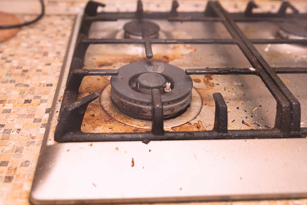 Bless This Mess Cleaning Stove Before